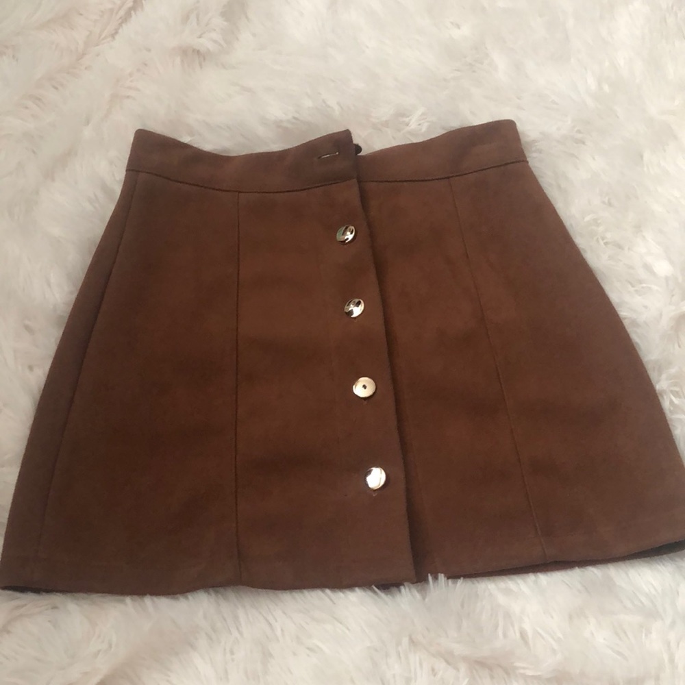 Small polyester/cotton brown mini skirt.